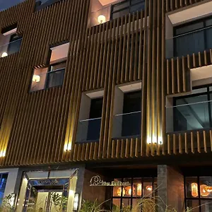 فندق تجريد سويتس 